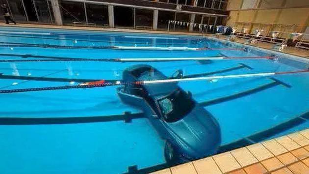 Driver fell into pool in France