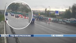 On MKAD, Mazda driver hits road workers' equipment