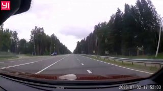 Girl narrowly avoids being hit by car on highway near Minsk