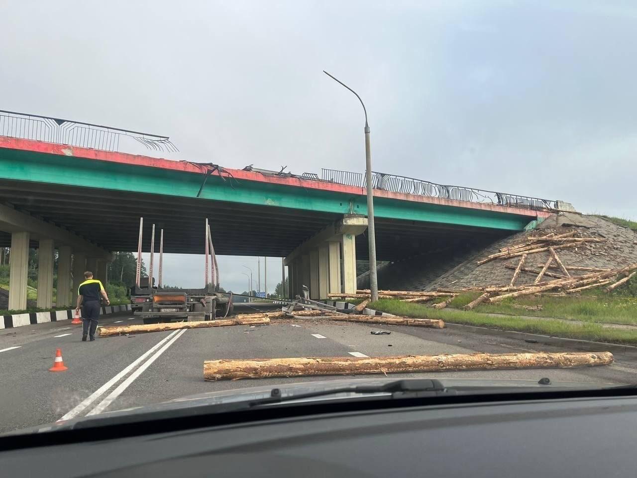 Trailer with logs plunges from bridge on M-3 highway near Minsk