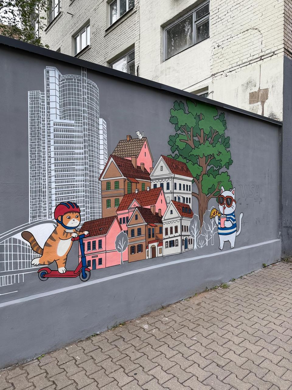 Gray wall of Lidbir Dvor transformed into a colorful cartoon city