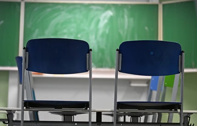 Latvia allows cutting lessons by 20% for military training; only just over half of children can read