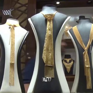 In Gaziantep, Turkey, grooms now get golden ties to match brides' heavy gold belts