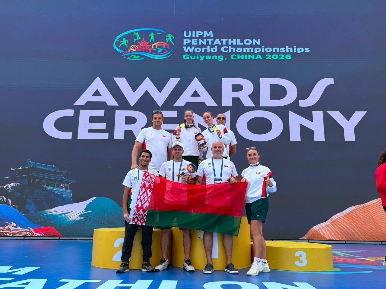 NOC President Viktor Lukashenko congratulates Belarusian pentathletes on World Championship medals in China