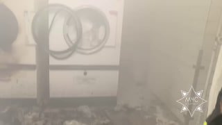 Rescuers extinguish fire in a laundry room in Minsk
