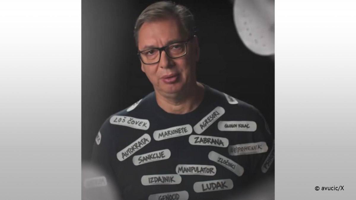 Vucic appears in election video wearing shirt covered in insulting labels