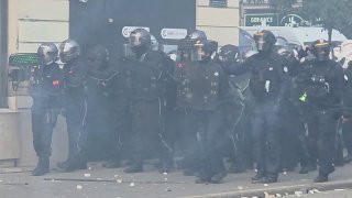French police use shields to disperse aggressive protesters for the first time