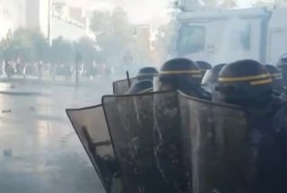 French police use water cannons to disperse protesting students in Paris