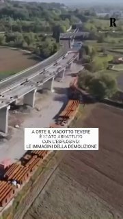 Controlled explosion collapses bridge spans in Italy