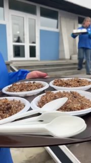 Evacuated residents of Aleshki are being provided hot meals at Gomel airport