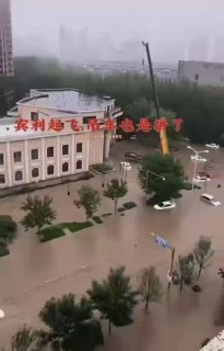 In China's Shenyang, car owner rents crane to lift vehicle and save it from flooding